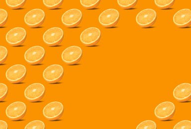 Image of Tasty fresh ripe oranges on orange background, space for text