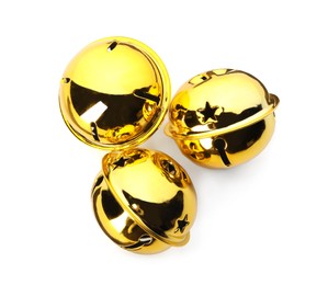 Photo of Shiny golden sleigh bells on white background, top view