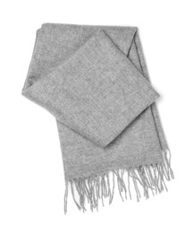 Photo of Stylish grey cashmere scarf isolated on white, top view