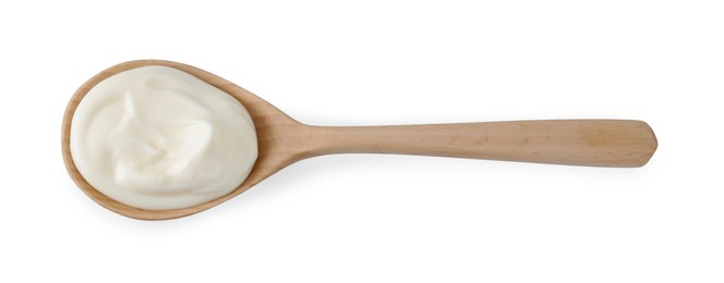 Photo of One wooden spoon with mayonnaise isolated on white, top view