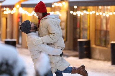 Photo of Lovely couple spending time together on city street