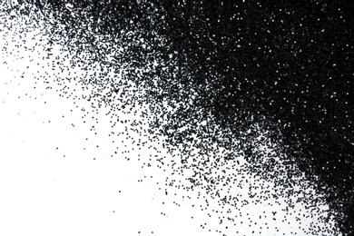 Photo of Shiny black glitter on white background, top view with space for text