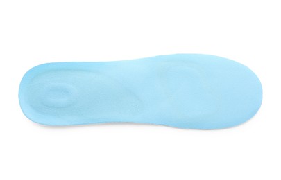 Photo of Light blue orthopedic insole isolated on white, top view