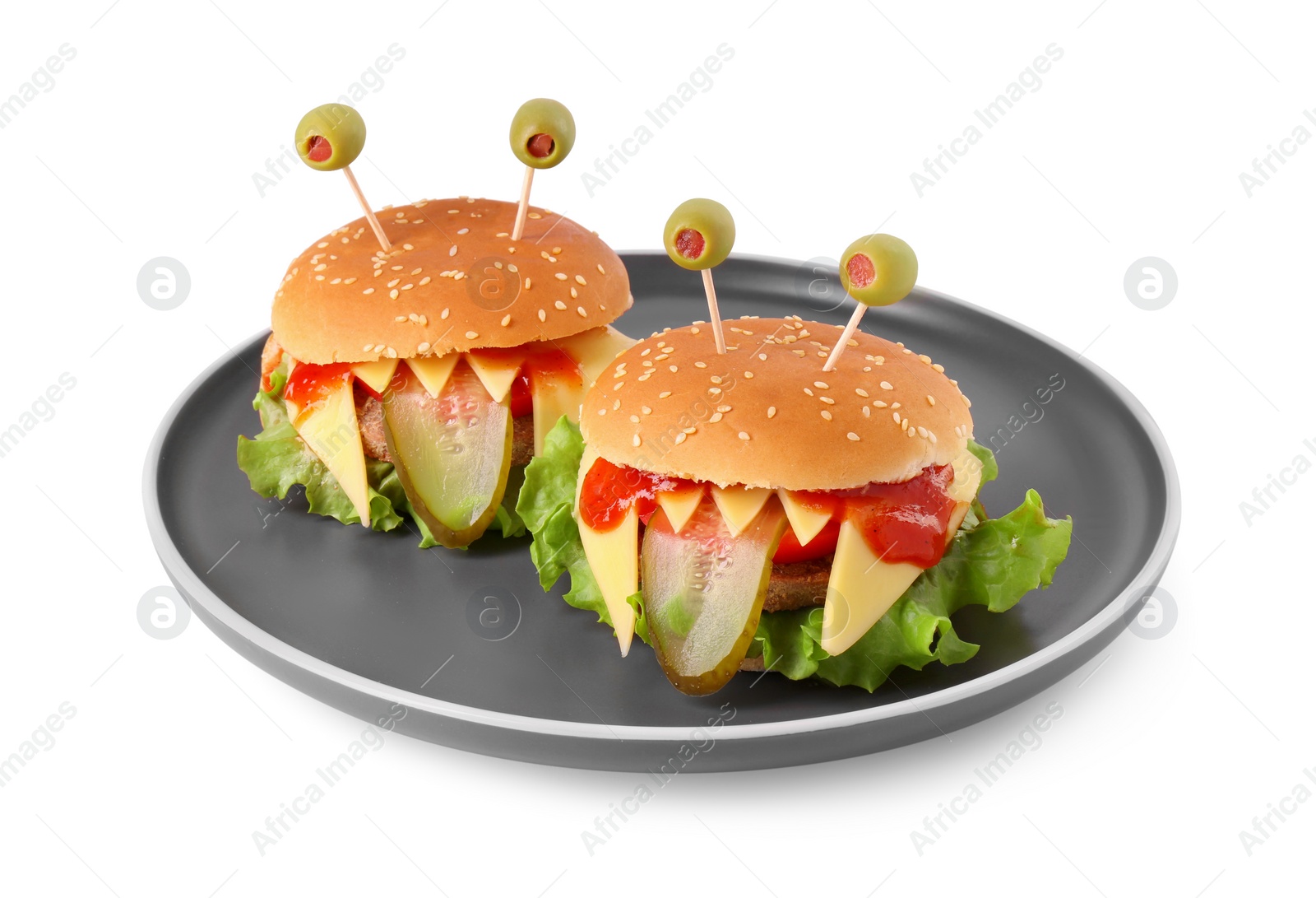 Photo of Cute monster burgers isolated on white. Halloween party food