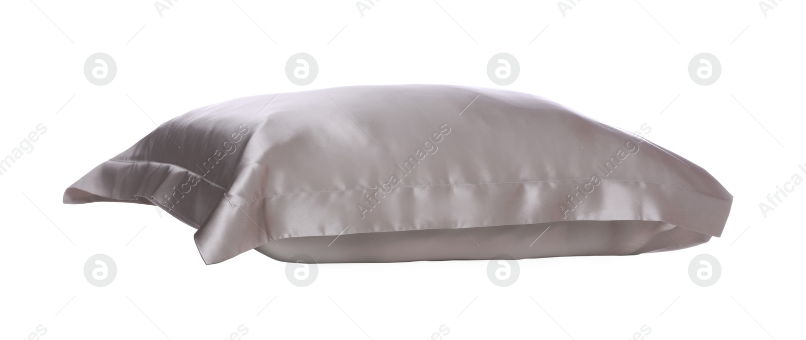 Photo of Soft beige silk pillow isolated on white