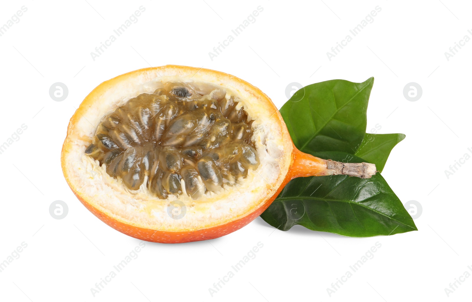 Photo of Half of delicious ripe granadilla with green leaves 
on white background