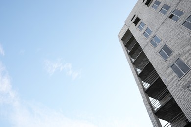 View of unfinished building against blue sky