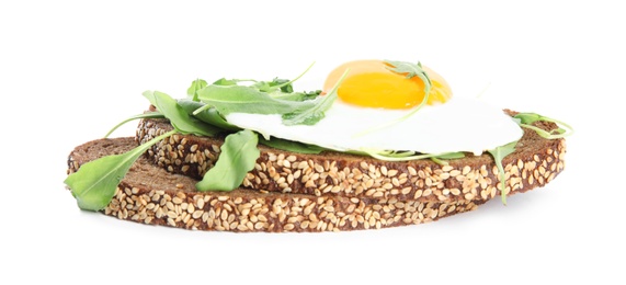 Delicious sandwich with arugula and fried egg isolated on white