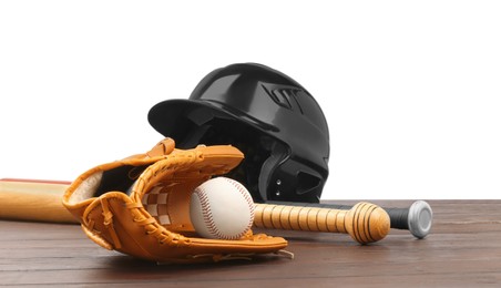 Photo of Baseball glove, bats, ball and batting helmet on wooden table against white background