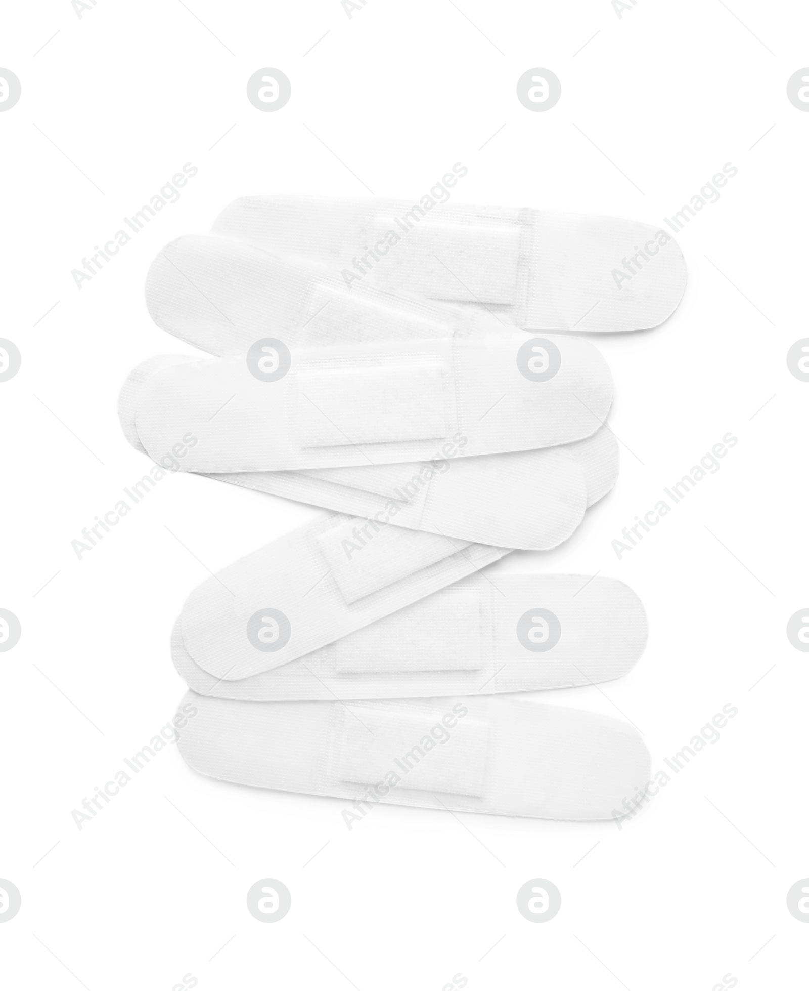 Medical sticking plasters isolated on white. First aid item Photo of Medical sticking plasters isolated on white. First aid item