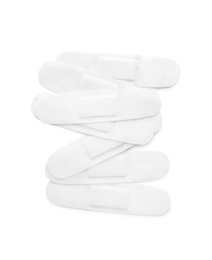 Photo of Medical sticking plasters isolated on white. First aid item