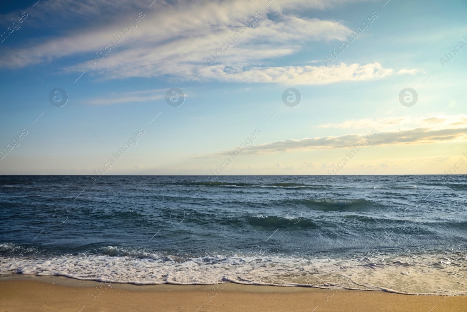 Photo of Picturesque view of beautiful sky with clouds over tropical beach