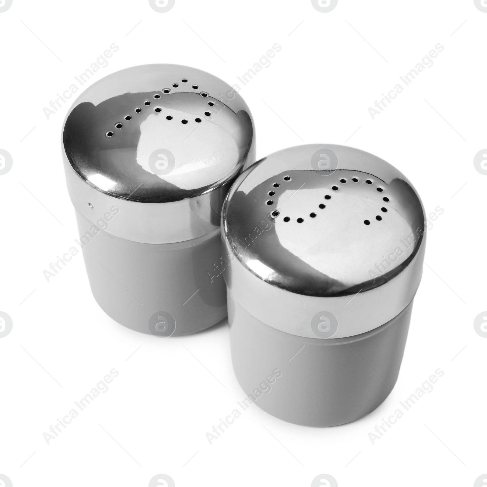 Photo of Salt and pepper shakers isolated on white