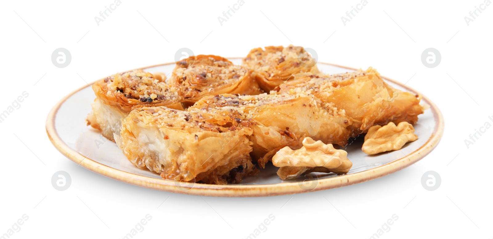 Photo of Eastern sweets. Pieces of tasty baklava isolated on white