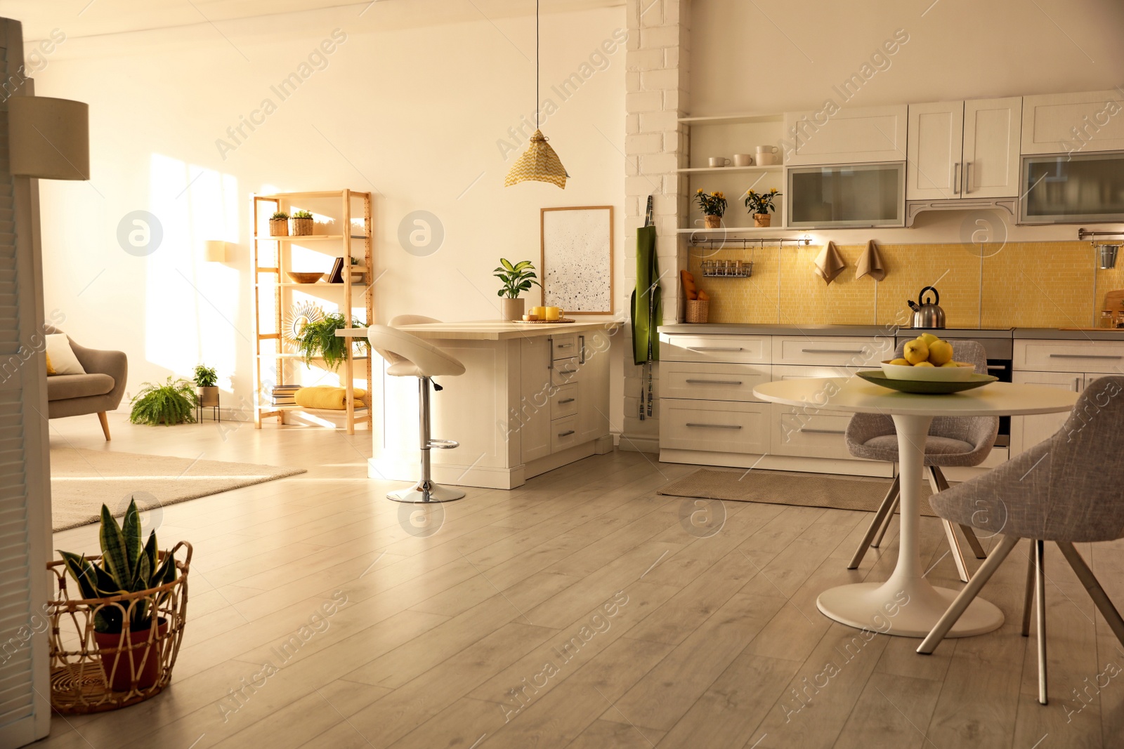 Photo of Modern kitchen interior with stylish white furniture