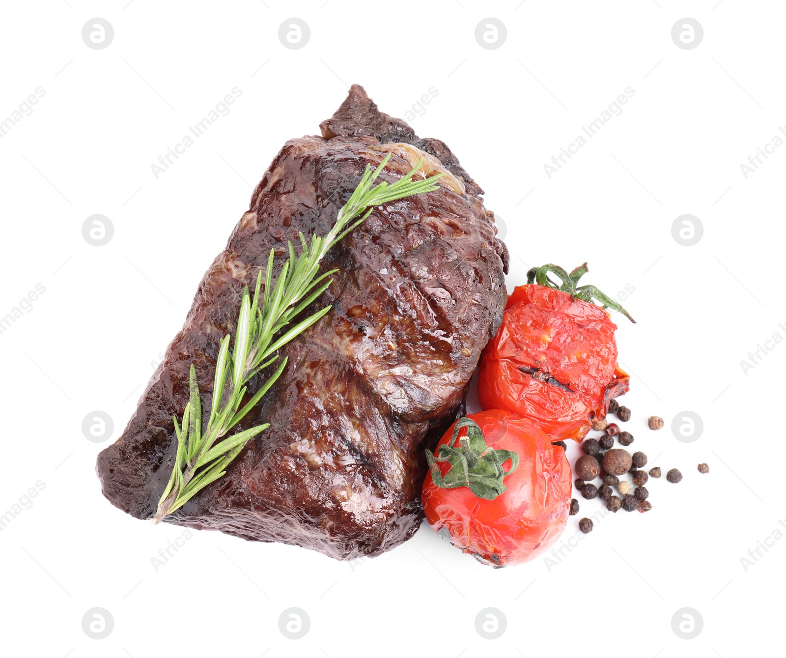 Photo of Piece of delicious grilled beef meat, tomatoes, peppercorns and rosemary isolated on white, top view