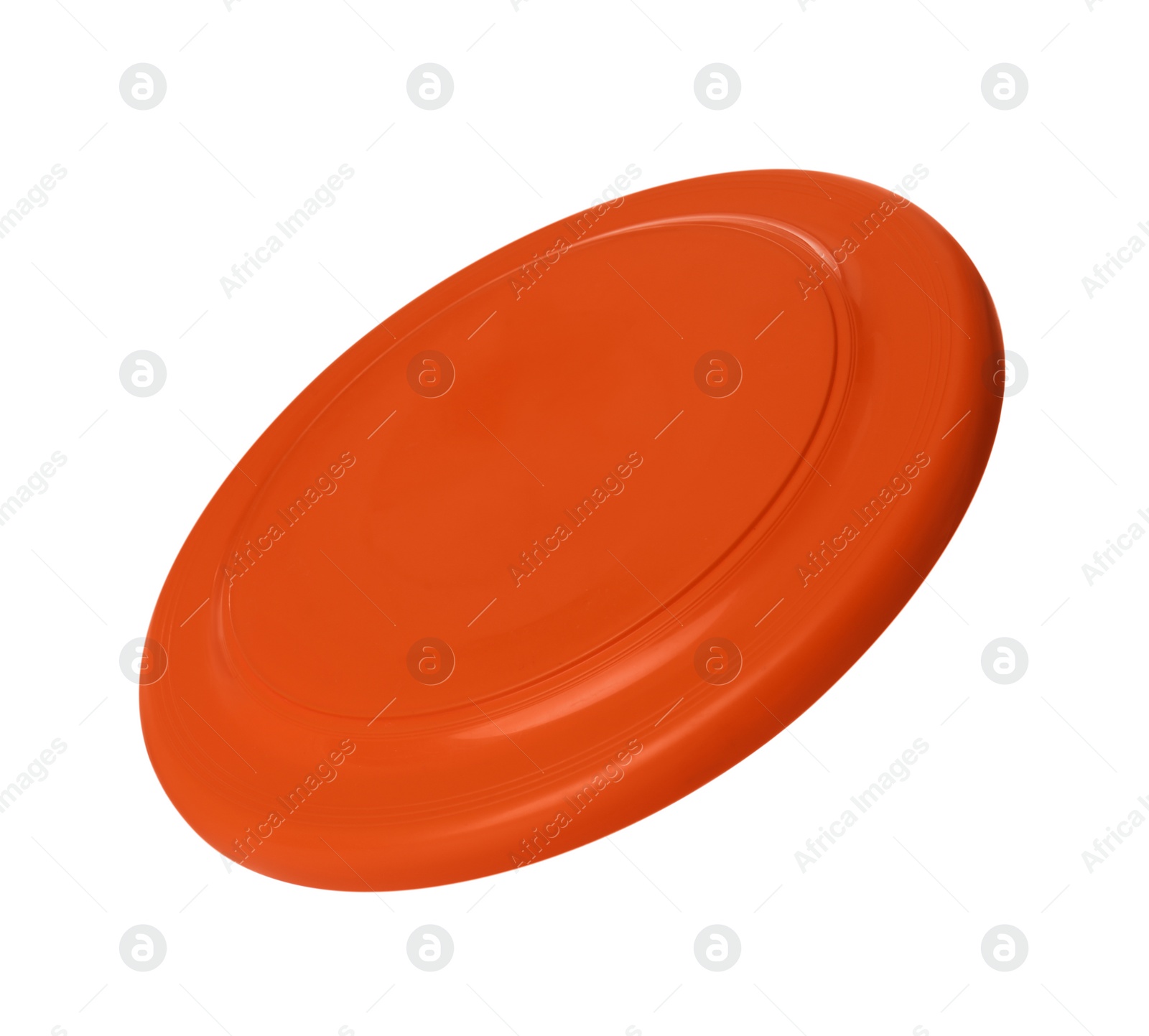 Photo of Orange plastic frisbee disk isolated on white