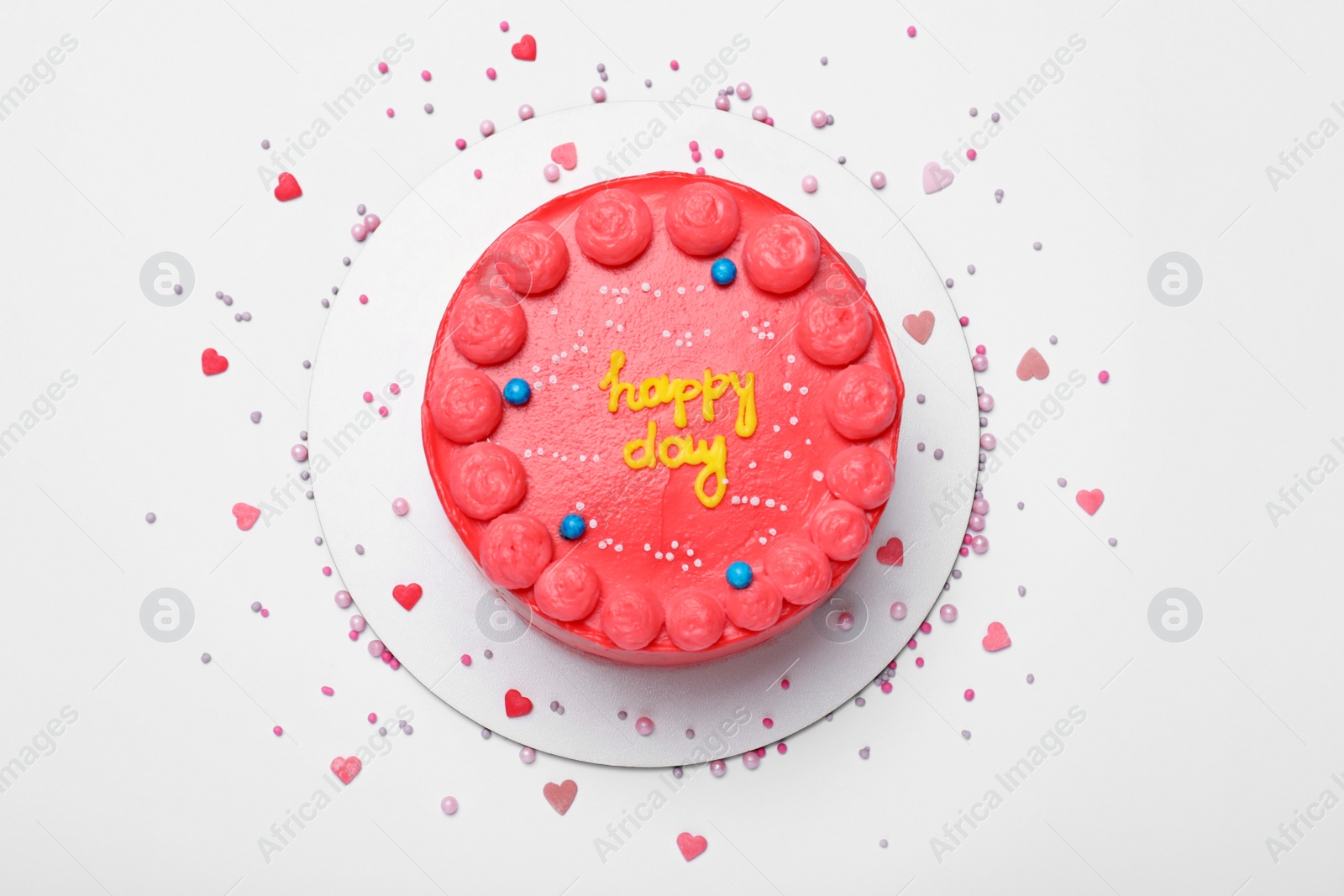 Photo of Cute bento cake with tasty cream and decor on white background, top view