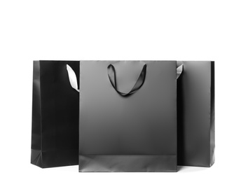 Photo of Paper shopping bags isolated on white. Mock up for design