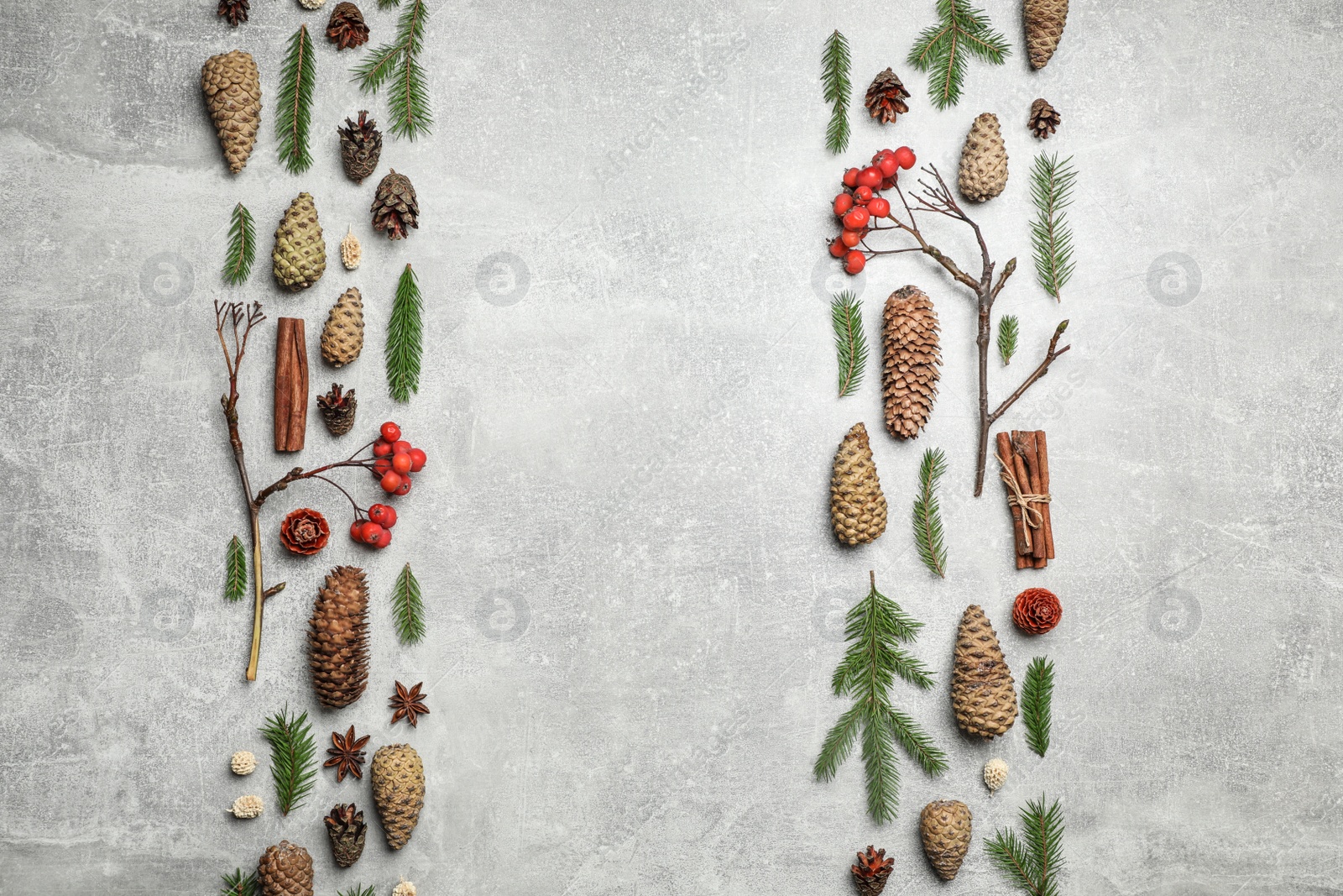 Photo of Flat lay composition with pinecones on light grey background, space for text