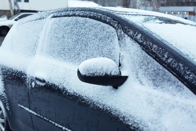 Photo of Car covered with snow outdoors. Space for text
