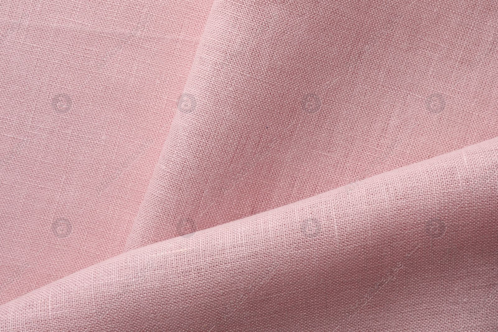 Photo of Texture of pink fabric as background, top view