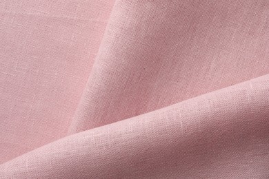 Texture of pink fabric as background, top view