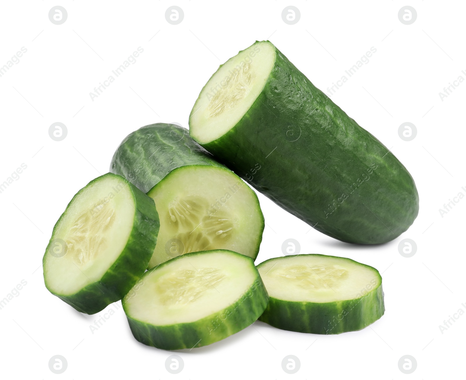 Photo of Halves and slices of long cucumber isolated on white