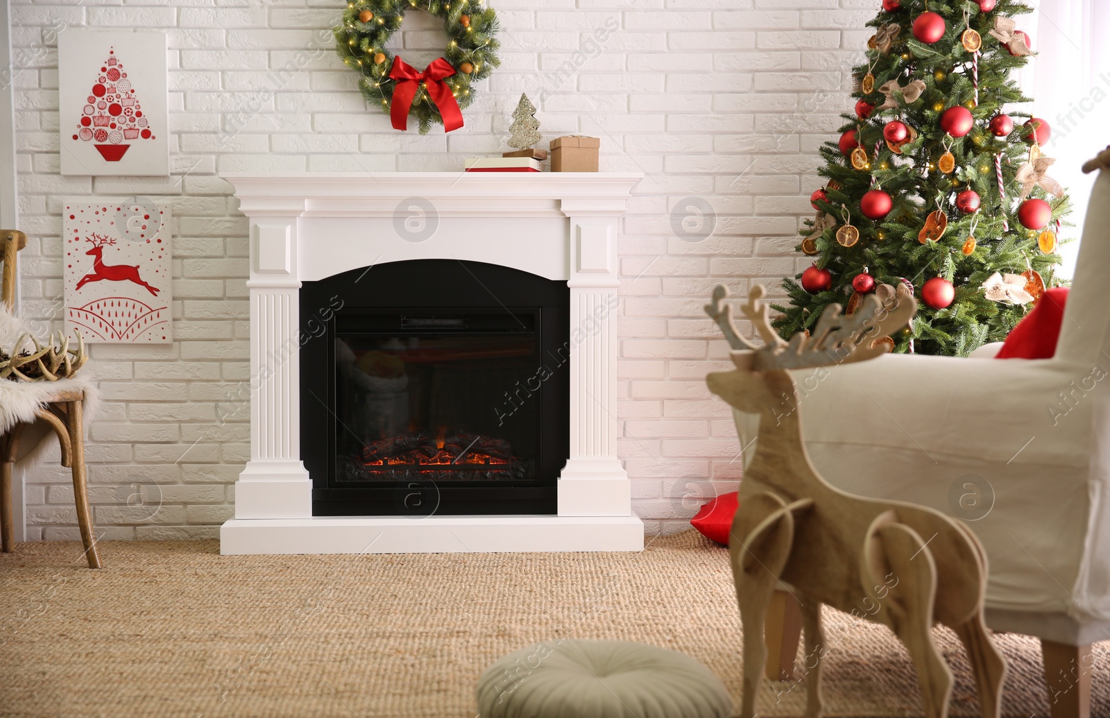 Photo of Beautiful living room interior with decorated Christmas tree and modern fireplace