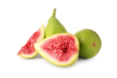 Photo of Cut and whole fresh green figs isolated on white