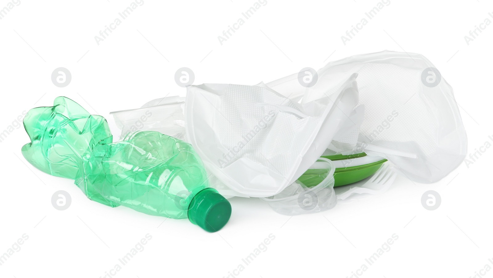 Photo of Pile of different plastic items on white background