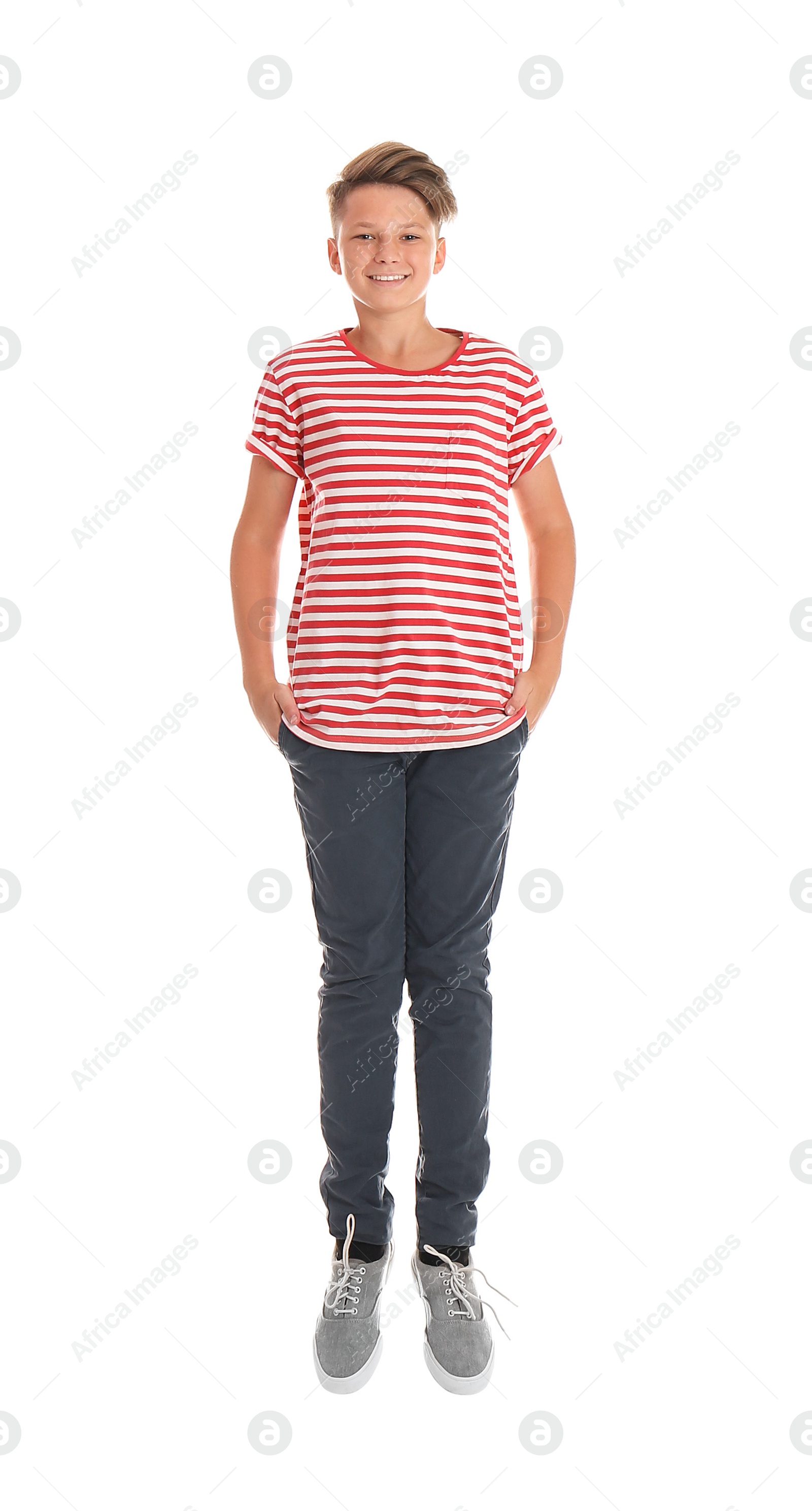 Photo of Teenage boy in casual clothes on white background