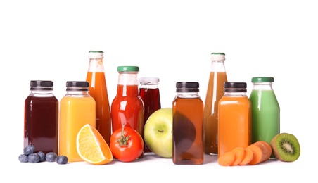 Photo of Bottles with different drinks and ingredients on white background