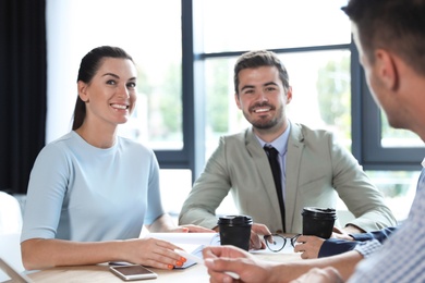 Photo of Office employees having business training at workplace