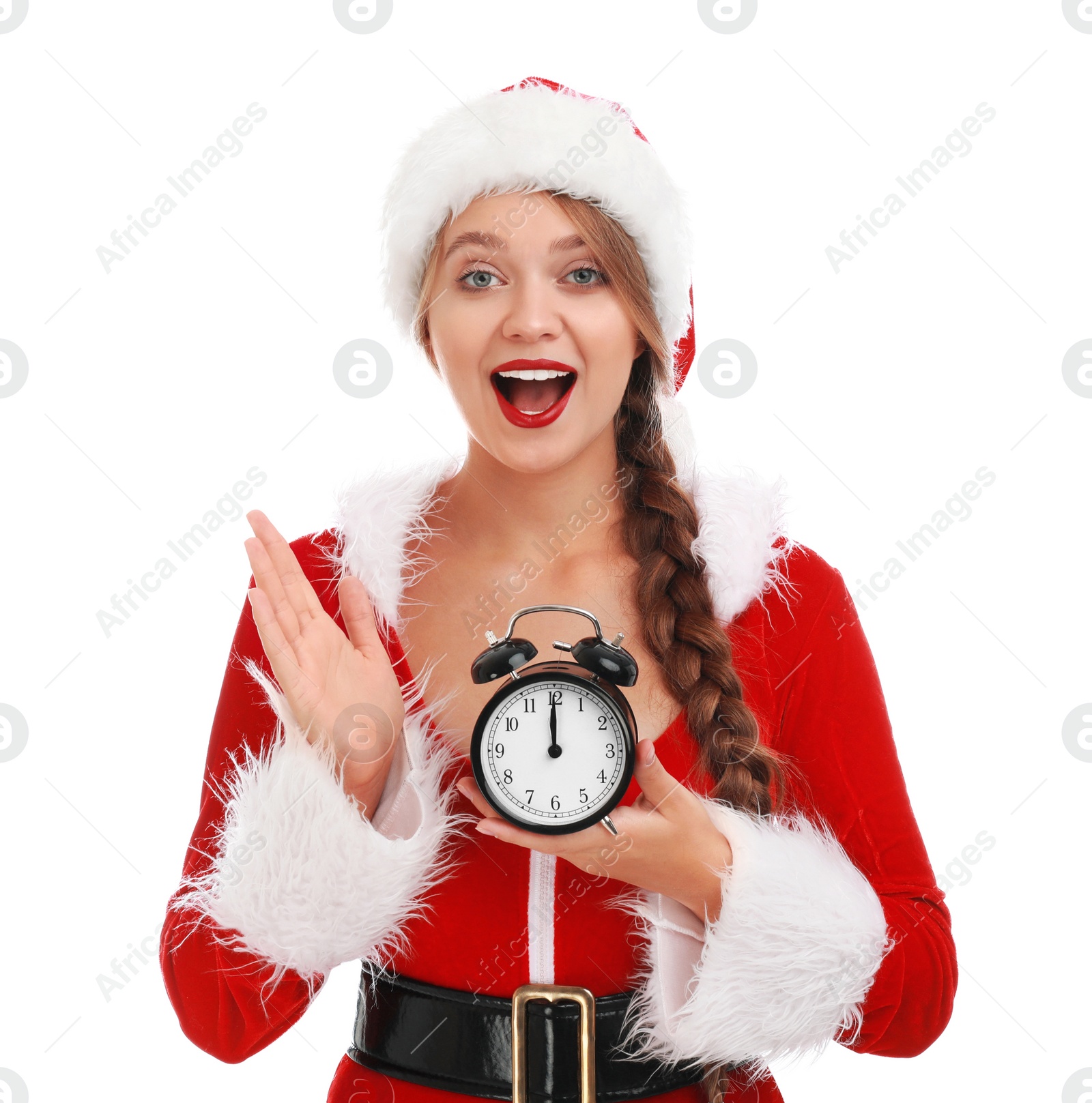 Photo of Beautiful Santa girl with alarm clock on white background. Christmas eve