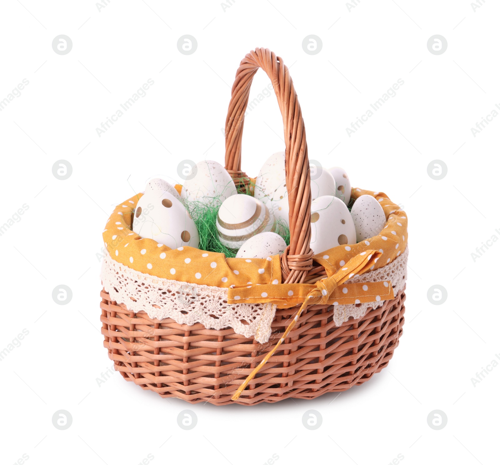 Photo of Wicker basket with beautifully painted Easter eggs isolated on white