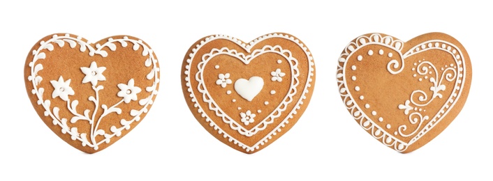 Set of Christmas gingerbread heart shaped cookies on white background. Banner design