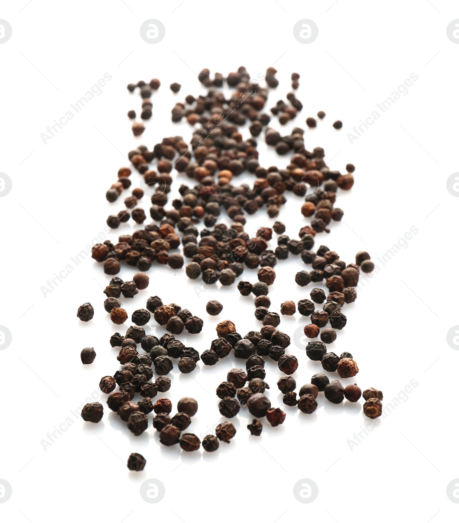 Photo of Black pepper grains on white background, top view. Natural spice