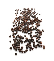 Photo of Black pepper grains on white background, top view. Natural spice