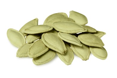Heap of pumpkin seeds isolated on white