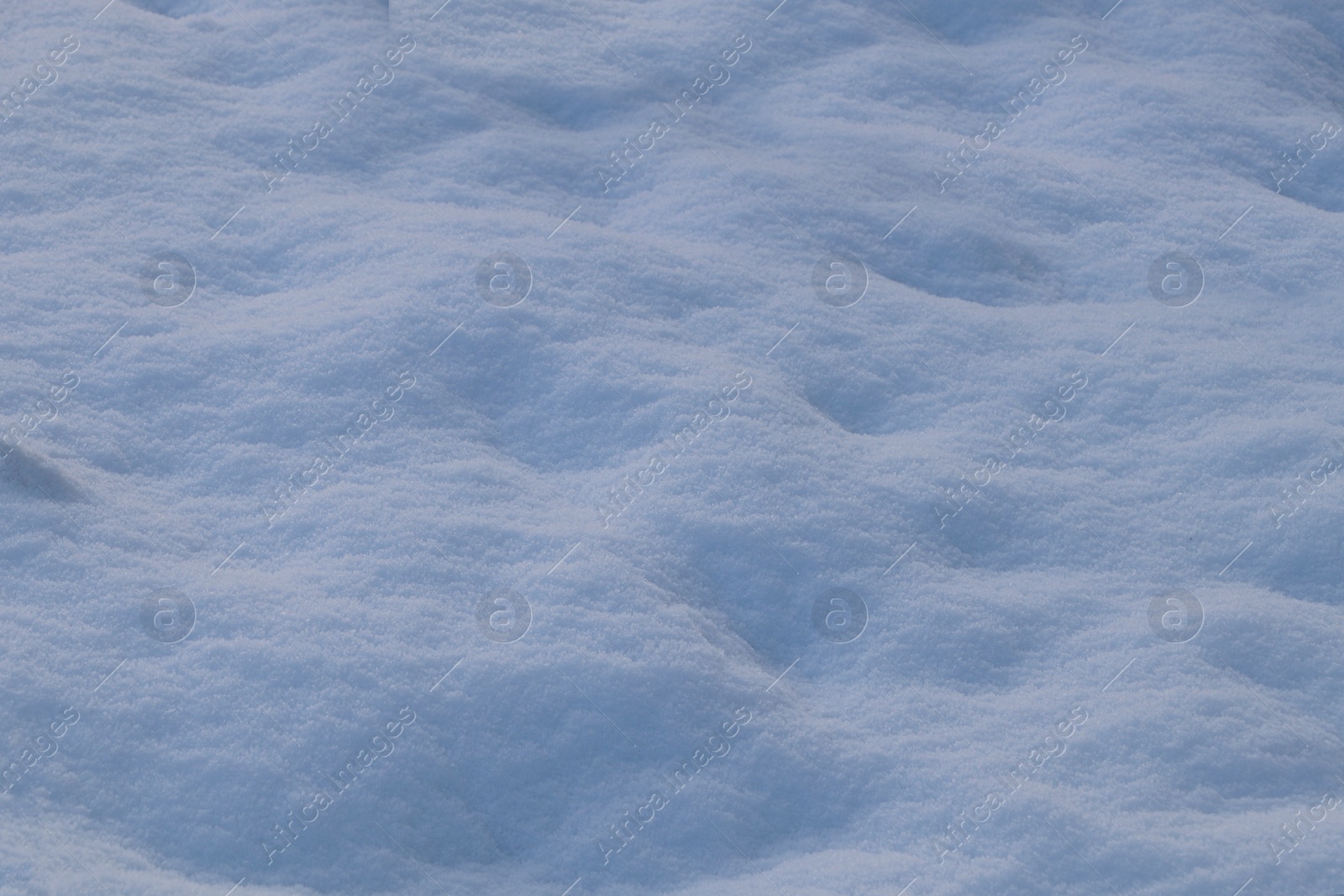 Photo of Beautiful snow as background, closeup view. Winter weather