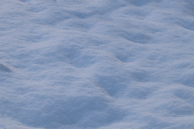 Photo of Beautiful snow as background, closeup view. Winter weather