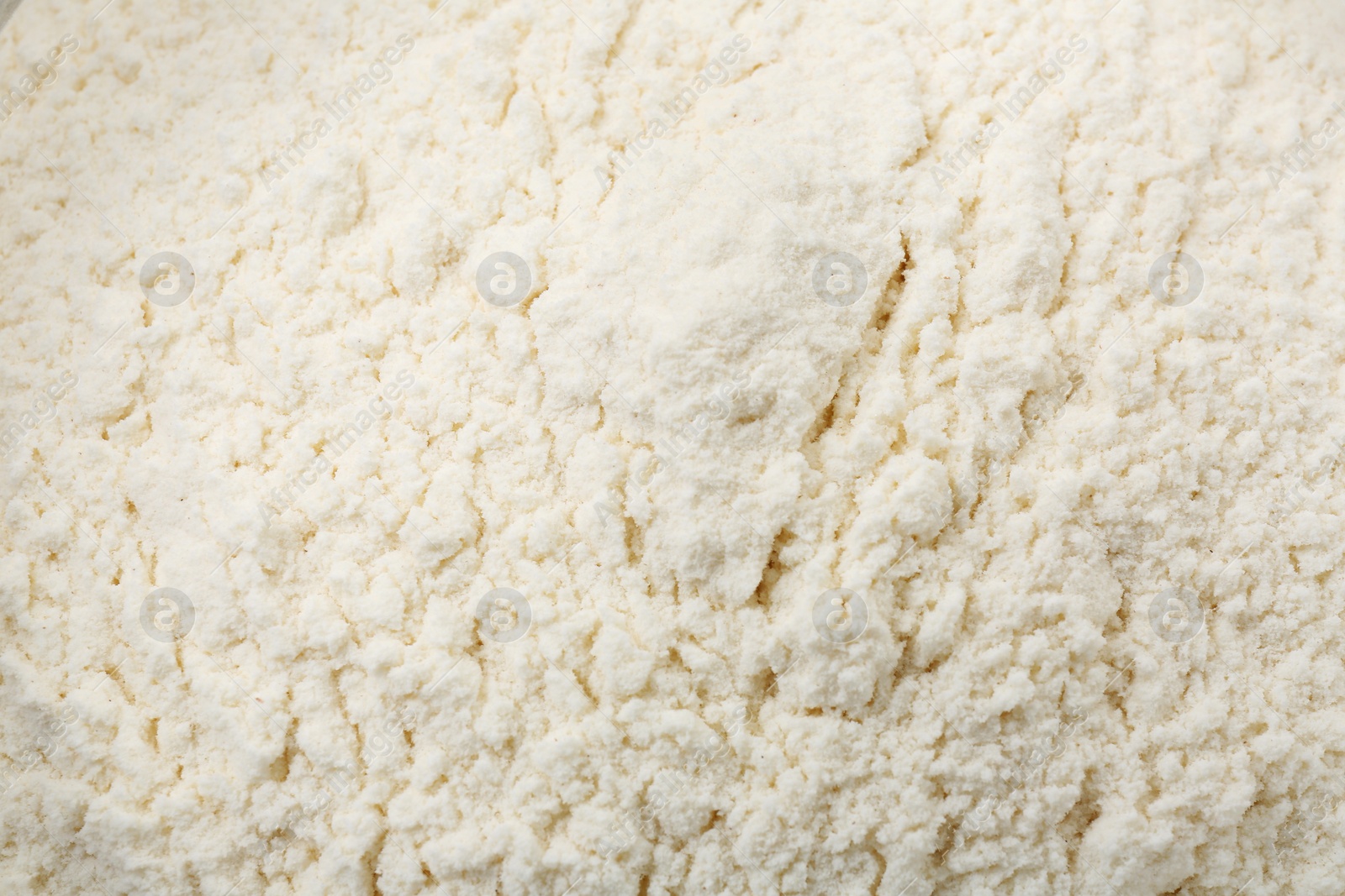 Photo of Texture of baking powder as background, top view