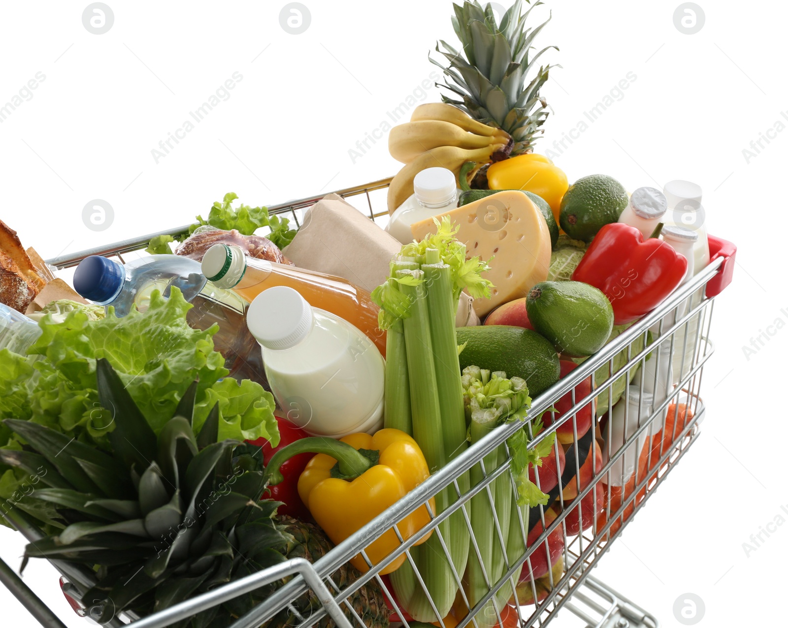 Photo of Shopping cart with groceries on white background