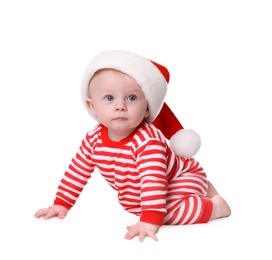 Cute baby in Santa hat and bright Christmas pajamas on white background