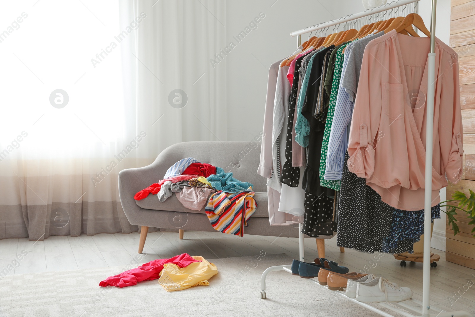 Photo of Mess in dressing room, space for text. Renew wardrobe