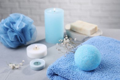 Photo of Beautiful composition with aromatic bath bomb on grey table