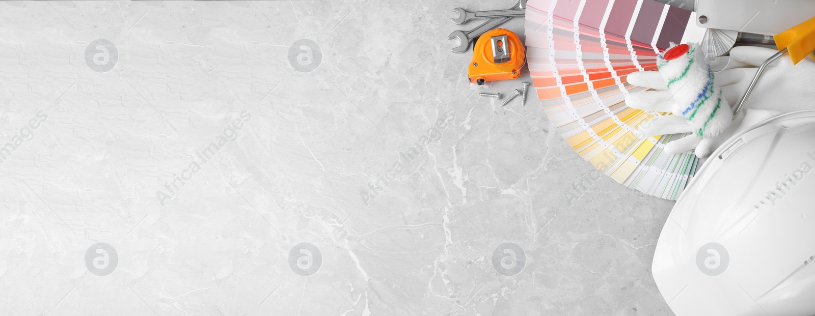 Image of Flat lay composition with different construction tools on marble background. space for text. Banner design