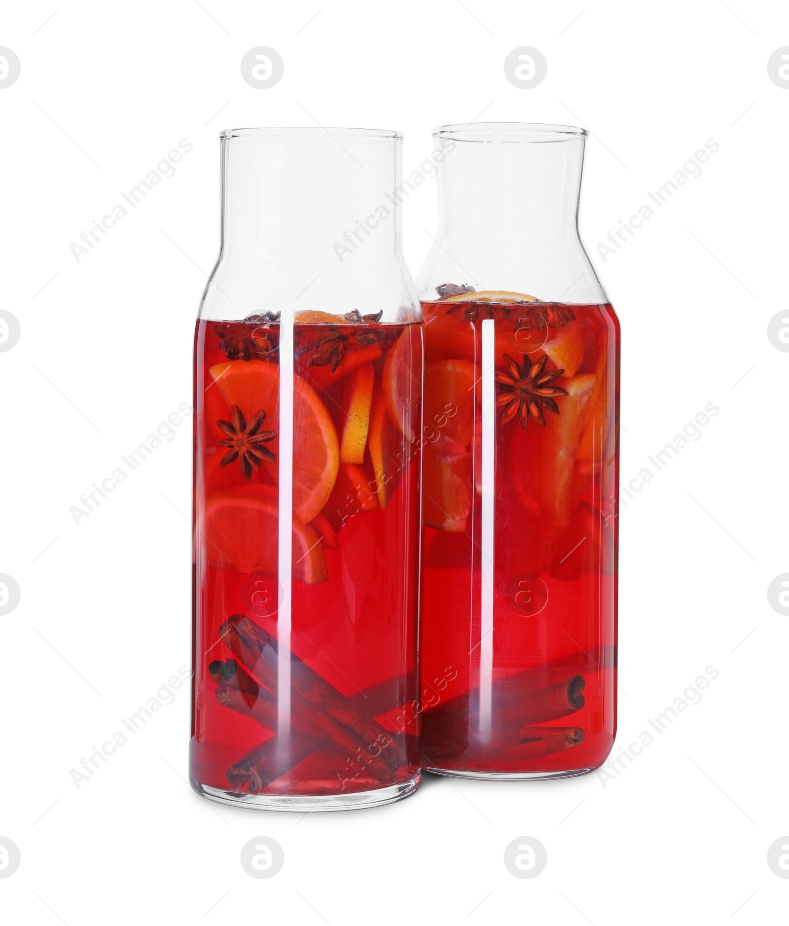 Photo of Jugs with tasty punch drink isolated on white