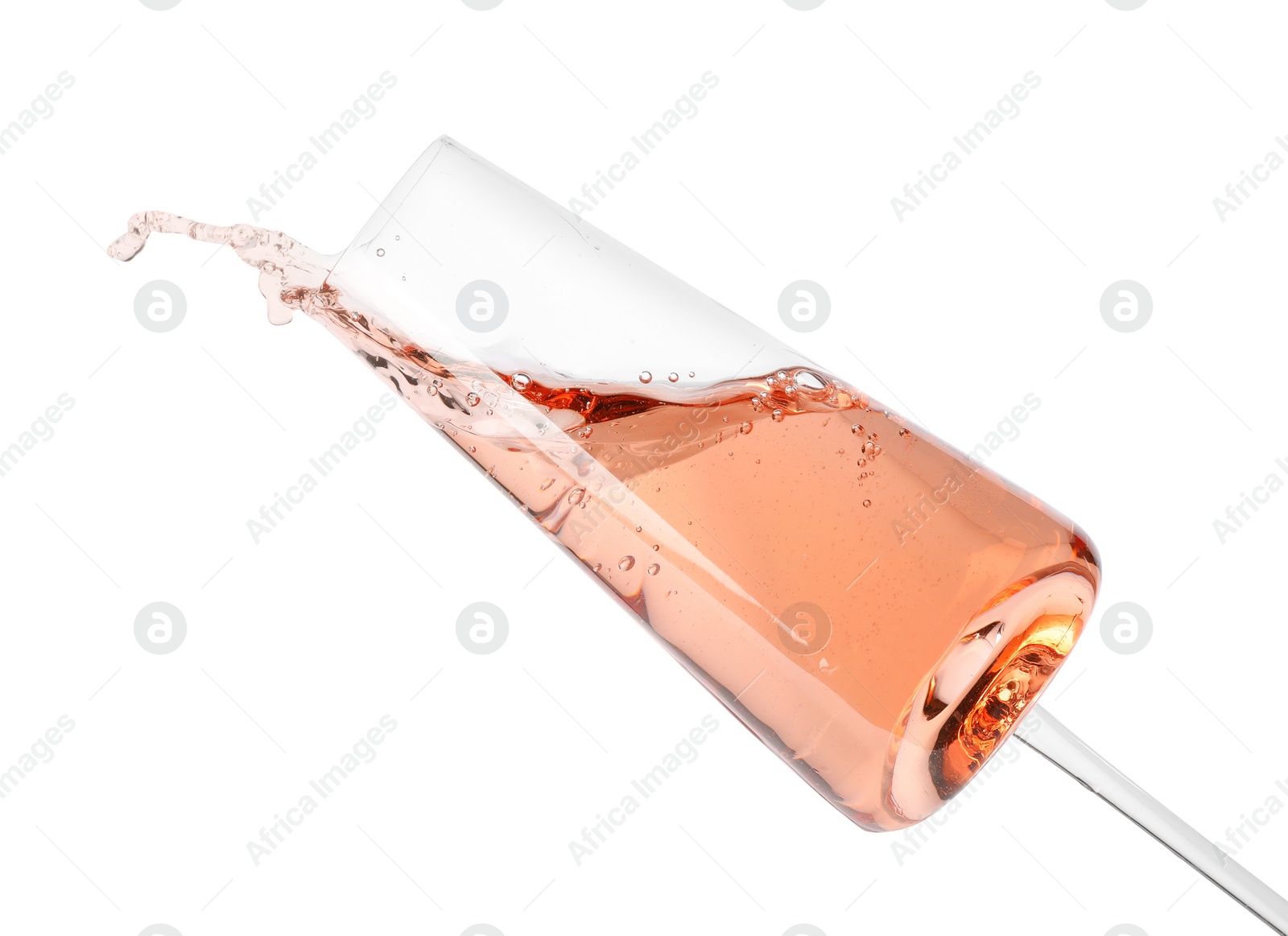 Photo of Glass of rose champagne isolated on white